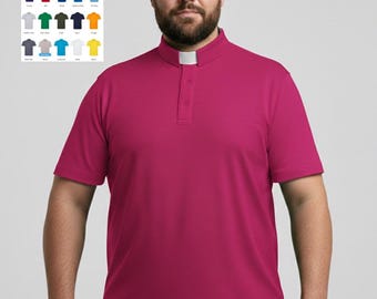 May include: A magenta short-sleeved clergy shirt with a white clerical collar insert and a buttoned placket. The image includes a color chart labeled 20 COLOURS displaying twenty different shirt color options in a grid format for selection.