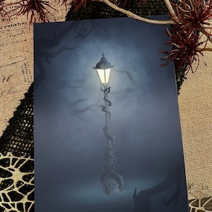 May include: A single, glowing street lamp with a dark blue background. The lamp is wrapped in vines and has a round, glass globe.