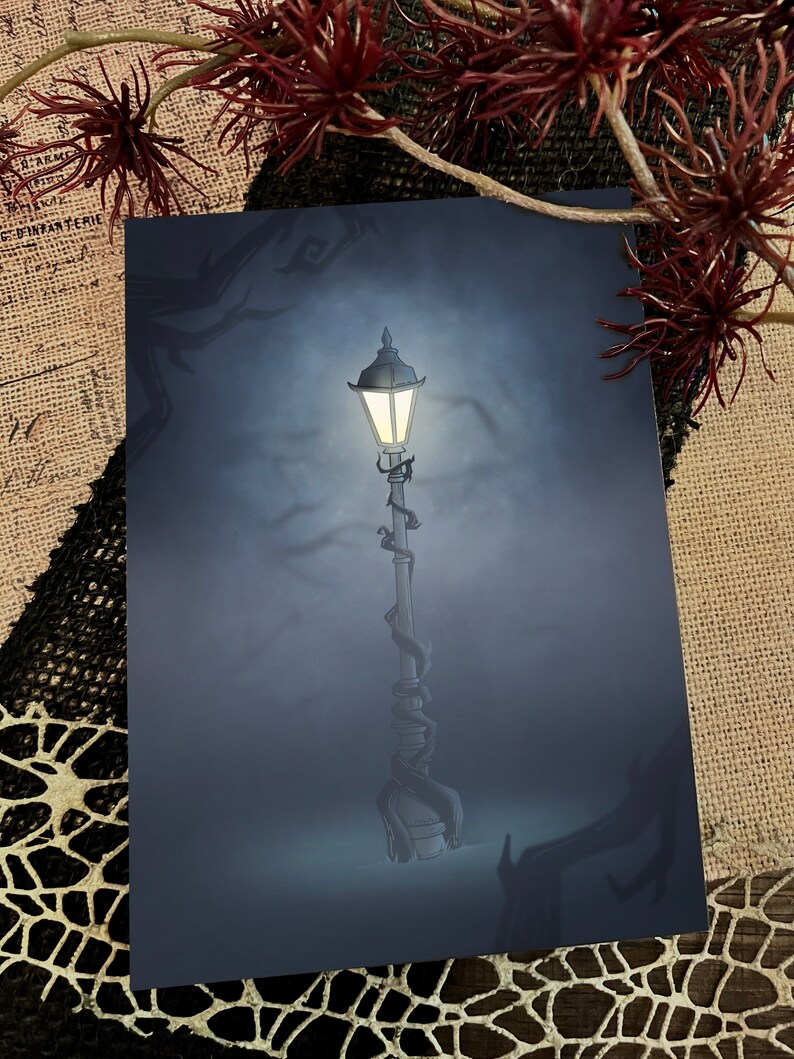 May include: A single, glowing street lamp with a dark blue background. The lamp is wrapped in vines and has a round, glass globe.