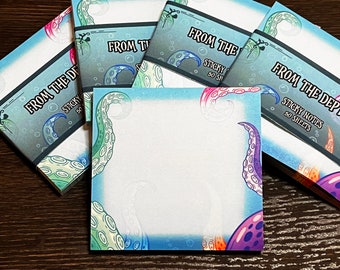 May include: A stack of colorful sticky note pads with an octopus design. The pads are blue, green, and purple with white writing that says "From the Depth" and "Sticky Notes 50 Sheets".