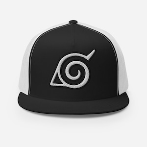 May include: Black and white baseball cap with a white embroidered spiral leaf design. The cap has a black peak and crown with a white mesh back. The cap is a trucker style.
