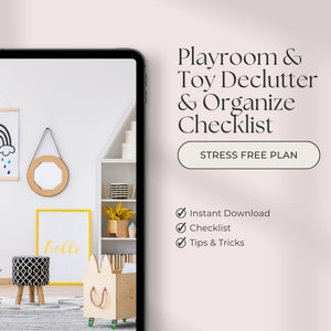 May include: A digital tablet displaying a checklist for decluttering and organizing a playroom. The checklist includes the text "Playroom & Toy Declutter & Organize Checklist" and "STRESS FREE PLAN". The checklist also includes the following bullet points: "Instant Download", "Checklist", and "Tips & Tricks".
