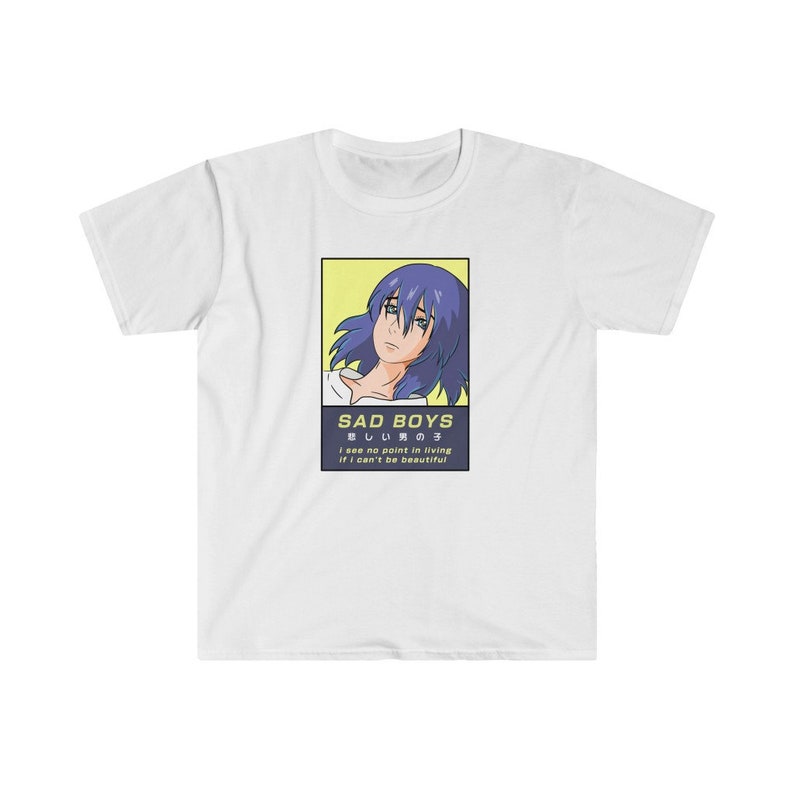 May include: A white t-shirt with a graphic print of an anime character with blue hair. The text "SAD BOYS" is printed in black with the Japanese text "悲しい男の子" below it. The text "I see no point in living if I can't be beautiful" is printed in black below the Japanese text.