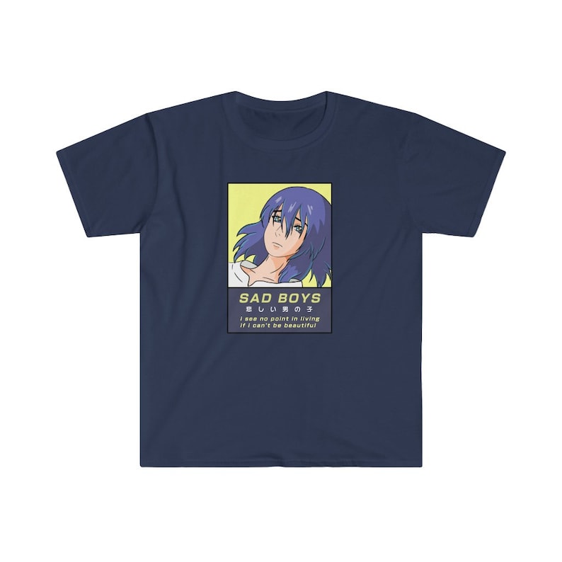 May include: A navy blue t-shirt with a graphic of an anime character with blue hair. The graphic is surrounded by a yellow border and includes the text "SAD BOYS", "悲しい男の子", "I see no point in living", and "If I can't be beautiful".