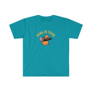 May include: A turquoise blue t-shirt with a cartoon character holding a log and the text "Hang in there" in yellow.