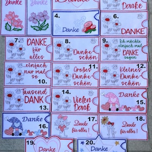 Può includere: Venti carte in feltro bianco con ricami colorati. Ogni carta ha un diverso messaggio di ringraziamento in tedesco. Le carte sono numerate da 1 a 20.