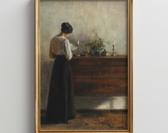 ドレッサーのそばで読書をする女性 | 雰囲気のある絵画 | ダウンロード可能なビンテージアートワーク | 静物写真 | 印刷可能なウォールアート