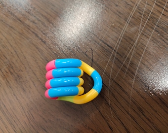 Blue, Pink, Green, Yellow Spiral Rainbow Fidget Toy