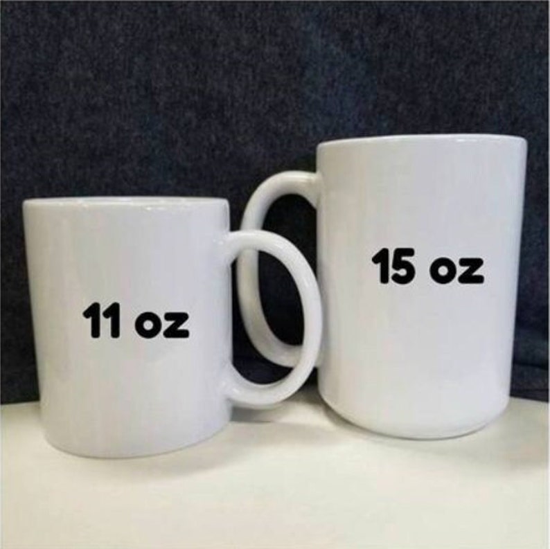 May include: Two white ceramic mugs, one is 11 oz and the other is 15 oz.
