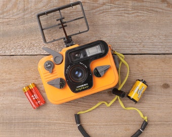 Hanimex Amphibian - Underwater Point and Shoot 35mm film Camera (package with new battery and film roll)