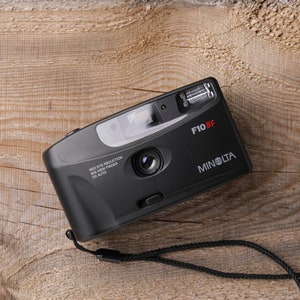 Minolta Family Maker III - Point and Shoot 35mm film Camera (package with new battery and film roll)
