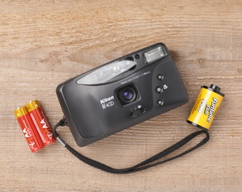 Nikon AF400 - Point and Shoot 35mm Film Camera (package with new battery and film roll)