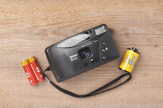 Nikon AF400 - Point and Shoot 35mm Film Camera (package with new battery and film roll)