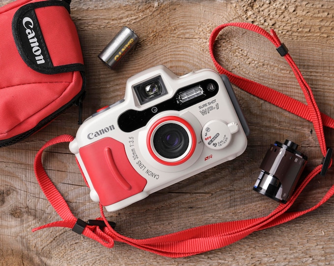 Canon Sure Shot WP1 35mm Weatherproof Point and Shoot Camera package