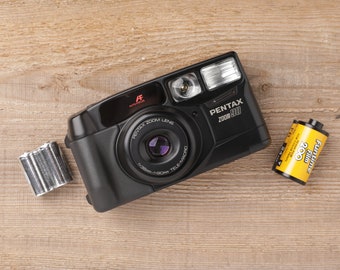 Pentax Zoom 90 - Point and Shoot 35mm film Camera (package with new battery and film roll)