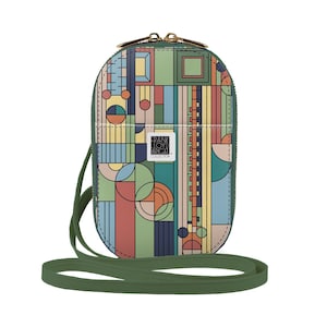 May include: A green crossbody bag with a geometric pattern in shades of yellow, red, blue, and green. The bag has a zipper closure and a Frank Lloyd Wright Collection label.