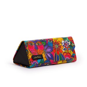 May include: A colorful, triangular eyeglasses case with a vibrant floral and face design. The case features a black base and a flap adorned with a mix of bright colors, including pink, purple, yellow, and blue. The case has the signature "Joel Bush" on the front.