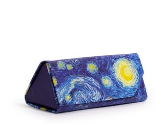 May include: A triangular eyeglasses case featuring a print of Van Gogh's "Starry Night" painting. The case is primarily dark blue with swirling brushstrokes in shades of yellow and white, and a solid dark blue base.