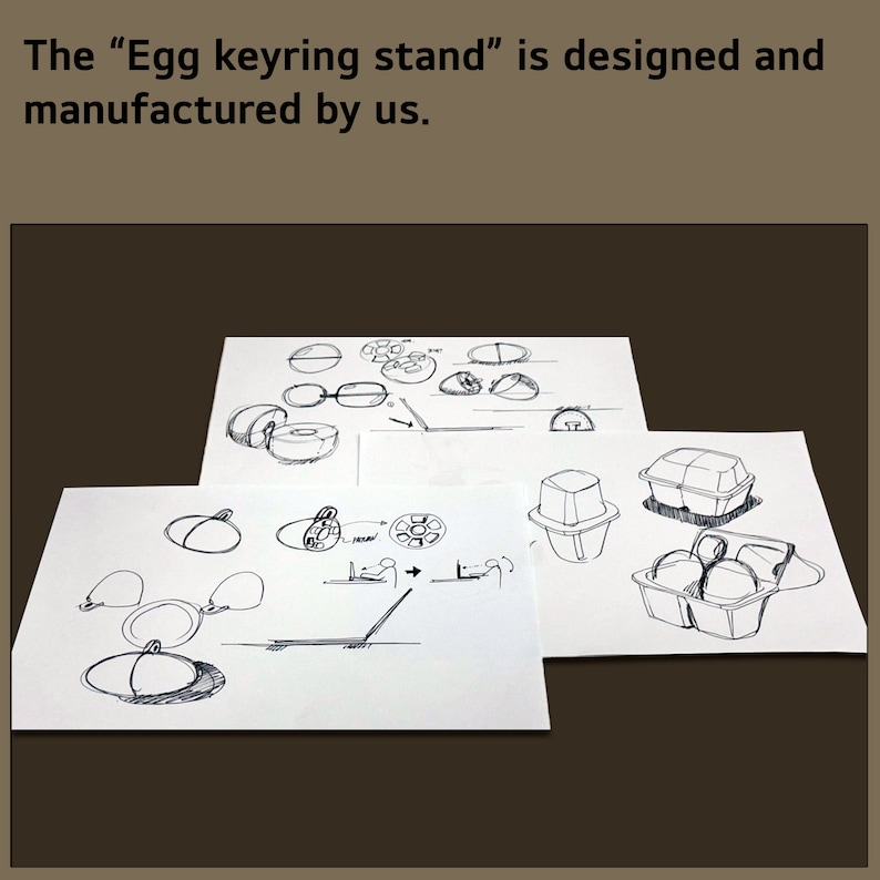 May include: Hand-drawn sketches of different designs for an egg-shaped keyring stand. The sketches show various angles and perspectives of the stand, with details of the shape and structure.