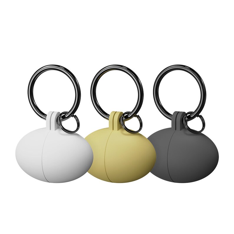 May include: Three keychains with different colored silicone cases: white, yellow, and black. Each keychain has a silver metal ring.
