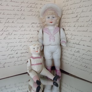 A Splendid Antique Set Of Two French Hand-Painted Miniature Dolls, An Exquisite And Rare Bisque Porcelain Mignonnette Figures, 19th Century