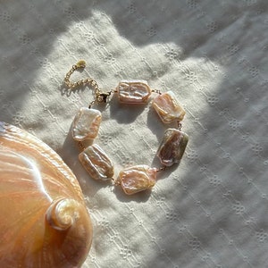 pulsera hecha a mano perlas de agua dulce y acero inoxidable imagen 1