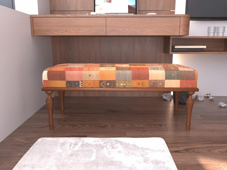 a modern living room with a wooden bench and a white rug on the floor.