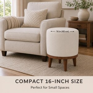 a beige armchair with a white ottoman in a living room setting. The ottoman is described as a compact size, measuring 16 inches in height and 40 centimeters in width.