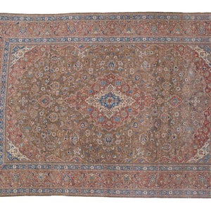 May include: A vintage Persian rug with a brown background and intricate floral patterns in shades of red, blue, and cream. The rug has a central medallion and a border with repeating motifs.