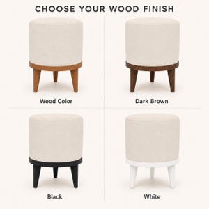 four different styles of ottomans, each with a distinct wood finish. The ottomans are arranged in a grid format, with each row representing a different wood color and each column representing a different style. The text "CHOOSE YOUR WOOD FINISH" is displayed above the ottomans, indicating that the image is a selection of ottomans with various wood finishes to choose from.