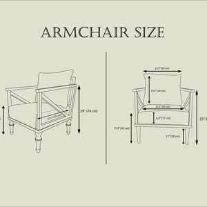 May include: Line drawing illustration of an armchair with measurements in inches and centimeters. The armchair is 29 inches tall, 27.5 inches wide, and 17.5 inches deep. The seat is 21.5 inches wide and 6.5 inches deep. The armchair has a cushion that is 23.5 inches wide and 19.5 inches tall.