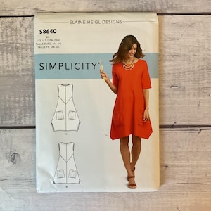 May include: A Simplicity sewing pattern envelope for Elaine Heigl Designs, model S8640, size U.S. 20W-28W. The package features a line drawing of a sleeveless dress with two front pockets and a photograph of a person wearing the orange version.
