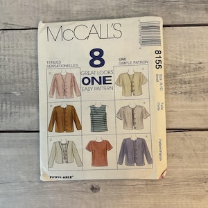 May include: McCall's sewing pattern featuring eight different garment styles. The pattern includes a variety of tops and jackets, with a size range of small (8,10). The cover has a white background with the McCall's logo and text.