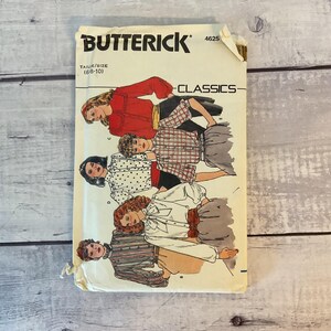 May include: A Butterick Classics 4625 sewing pattern envelope for sizes 6-8-10. The front features illustrations of four different blouse styles, including a red long-sleeve top, a plaid shirt, a polka dot blouse, and a striped button-down shirt.