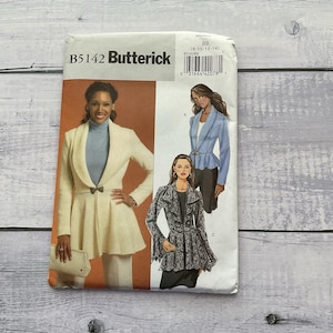 May include: A set of three ceramic mugs with a speckled, matte finish. The mugs are in shades of cream, light gray, and dark gray. Each mug has a simple, minimalist design, perfect for coffee or tea.