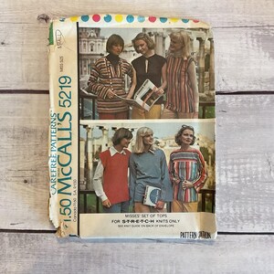 May include: Vintage McCall's 5219 sewing pattern envelope featuring images of women's tops. The envelope shows a variety of tops in different colors and patterns. The text on the envelope reads "MISSES' SET OF TOPS FOR S-T-R-E-T-C-H KNITS ONLY."