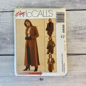 May include: An Easy McCall's 9590 sewing pattern envelope for a wardrobe collection. The front features illustrations of a long coat, a mid-length jacket, and a blazer in shades of brown. Text includes Easy McCall's, 9590, and Non-Stop Wardrobe.