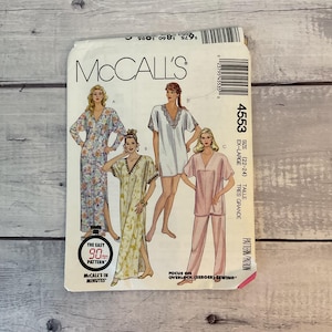 May include: A McCall's 4553 sewing pattern envelope for size EX-LARGE (22-24). The front displays illustrations of four garments: a floral maxi dress, a yellow patterned kaftan, a white tunic with lace trim, and a solid pink pajama set with pants.