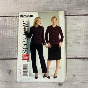 May include: A vintage sewing pattern titled "See & Sew" featuring illustrations of a woman in a burgundy jacket and black pants, and another in a burgundy jacket and black skirt. The pattern includes the size range (16-18-20-22).