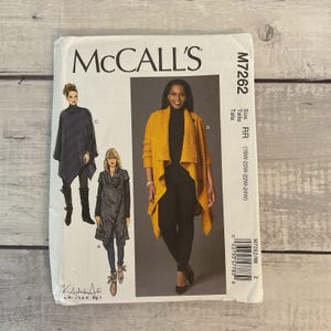 May include: A McCall's sewing pattern envelope featuring illustrations of women's outerwear designs. The envelope includes the text "McCall's" and pattern number M7262. The size range is indicated as RR (18W-20W-22W-24W).