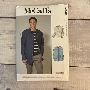 May include: McCall's sewing pattern featuring a man in a blue jacket and a striped shirt. The pattern includes multiple view options with simple instructions. The size is BB (44-46-48-50-52). Designed and printed in the USA.