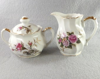 Vintage lidded sugar and creamer set made in Japan fine china floral roses gold scalloped lobed embossed pretty porcelain tea coffee setting