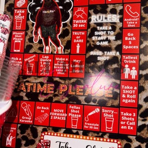 May include: A custom-made board game with a leopard print background and red and white game squares. The game includes instructions like "Take a Shot" and "Truth or Dare." A large image of a person is in the center of the board.