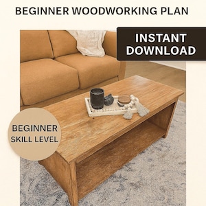 May include: A wooden coffee table with a lower shelf, displayed in a room setting. The table is light brown and has a rectangular shape. Text on the image reads "POTTERY BARN COFFEE TABLE DUPE" and "BEGINNER WOODWORKING PLAN". The image also says "INSTANT DOWNLOAD".