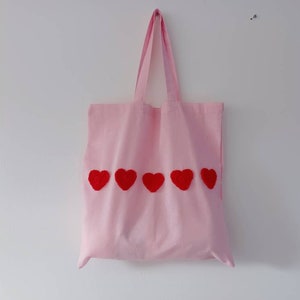 Pale pink cotton tote bag with handmade red crochet hearts  gift present summer festival valentines