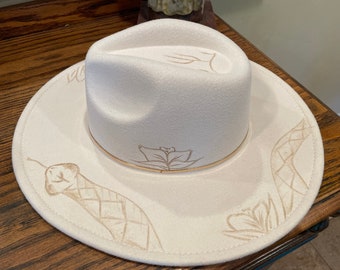 Hand Soldered rattlesnake hat.