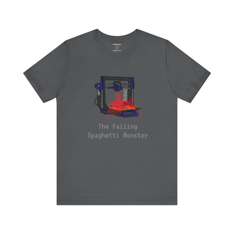 May include: A dark gray t-shirt with a blue and black 3D printer graphic. The printer is spewing out red filament, creating a "spaghetti monster" effect. The text "The Failing Spaghetti Monster" is printed below the graphic.
