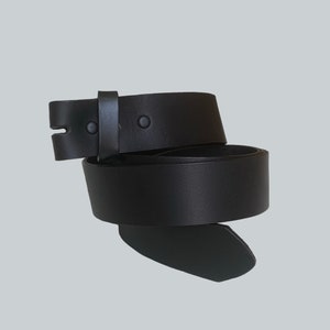 1.5”(38mm) wide black leather belt strap  w/snaps for buckle interchangeability.