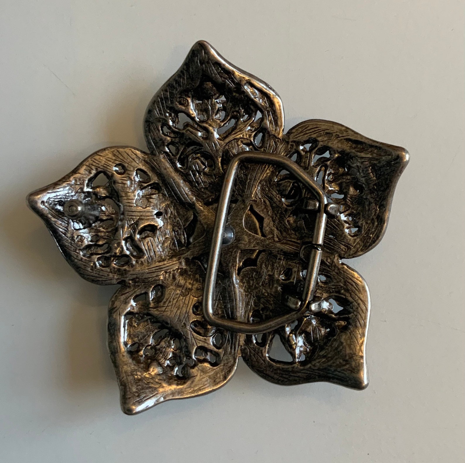 pre-owned ornate belt buckle faux stone vintage style design