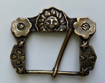 Vintage Hippie Bohemian belt buckle with Stars Sun and 4 Leaf Clovers.Antique brass.